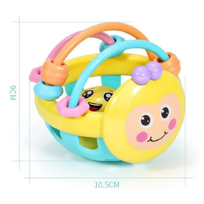Baby Play Ball with Soft Textured Elements, Movable Rings and Bright Colors in Yellow or Pink