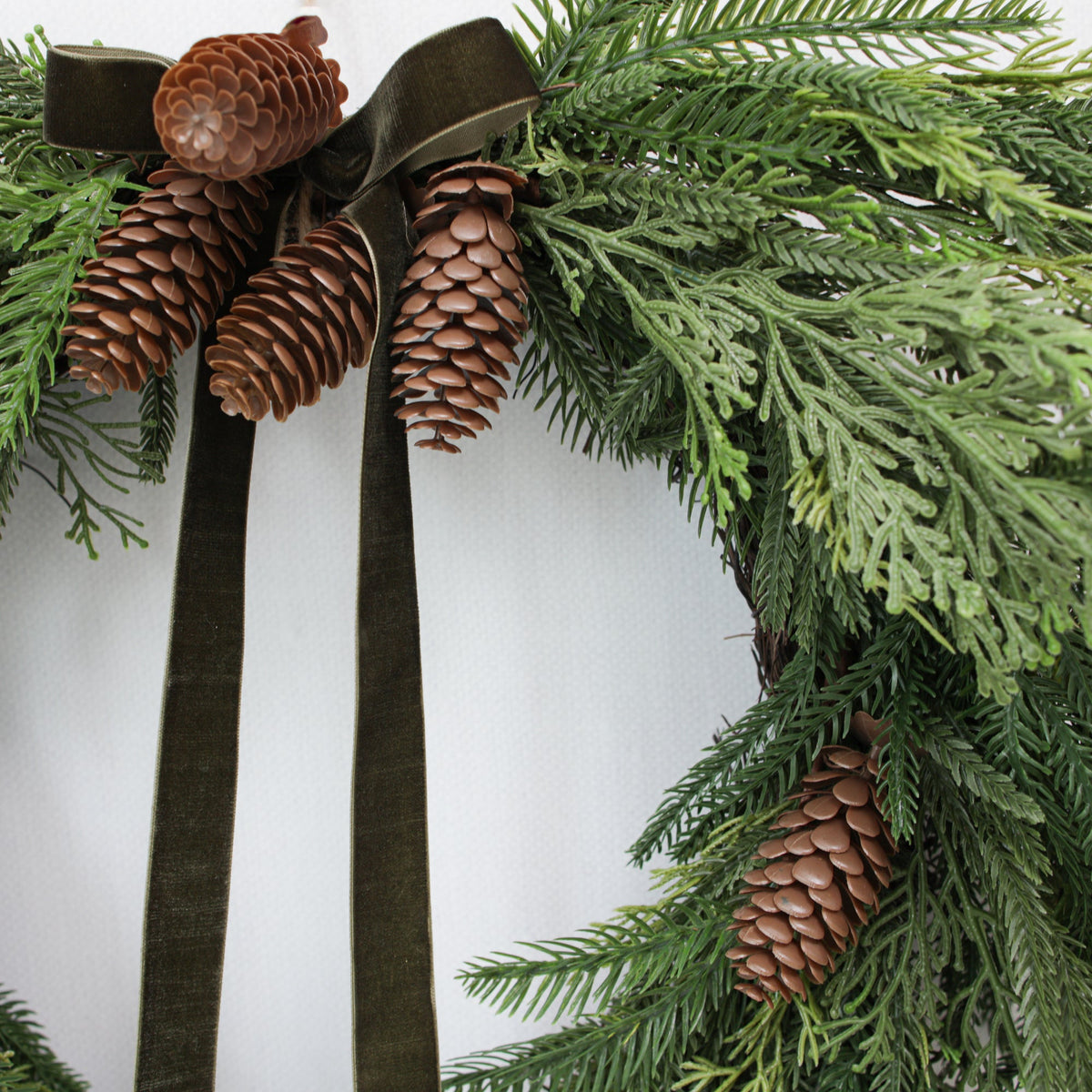 Heart Shaped Pine Wreath with Pine Cones and Hunter Green Ribbon 24 Inch